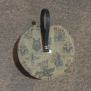 Round Tapestry Wig box with Black Strap. Vintage